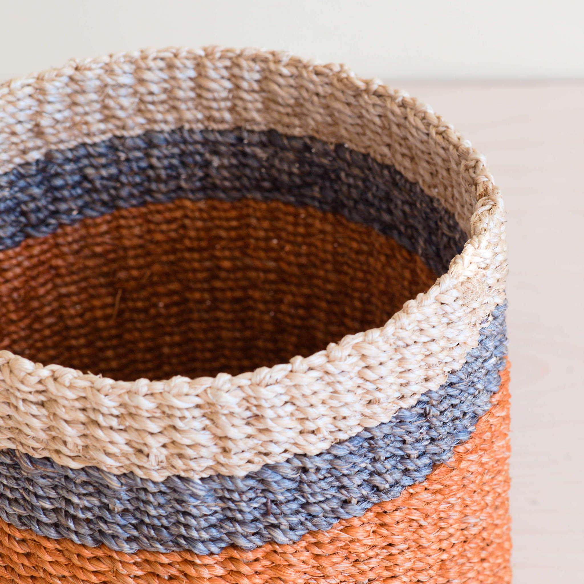 LIKHA_80004_Abaca-Cylinder-Tabletop-Basket_Coral-2.jpg