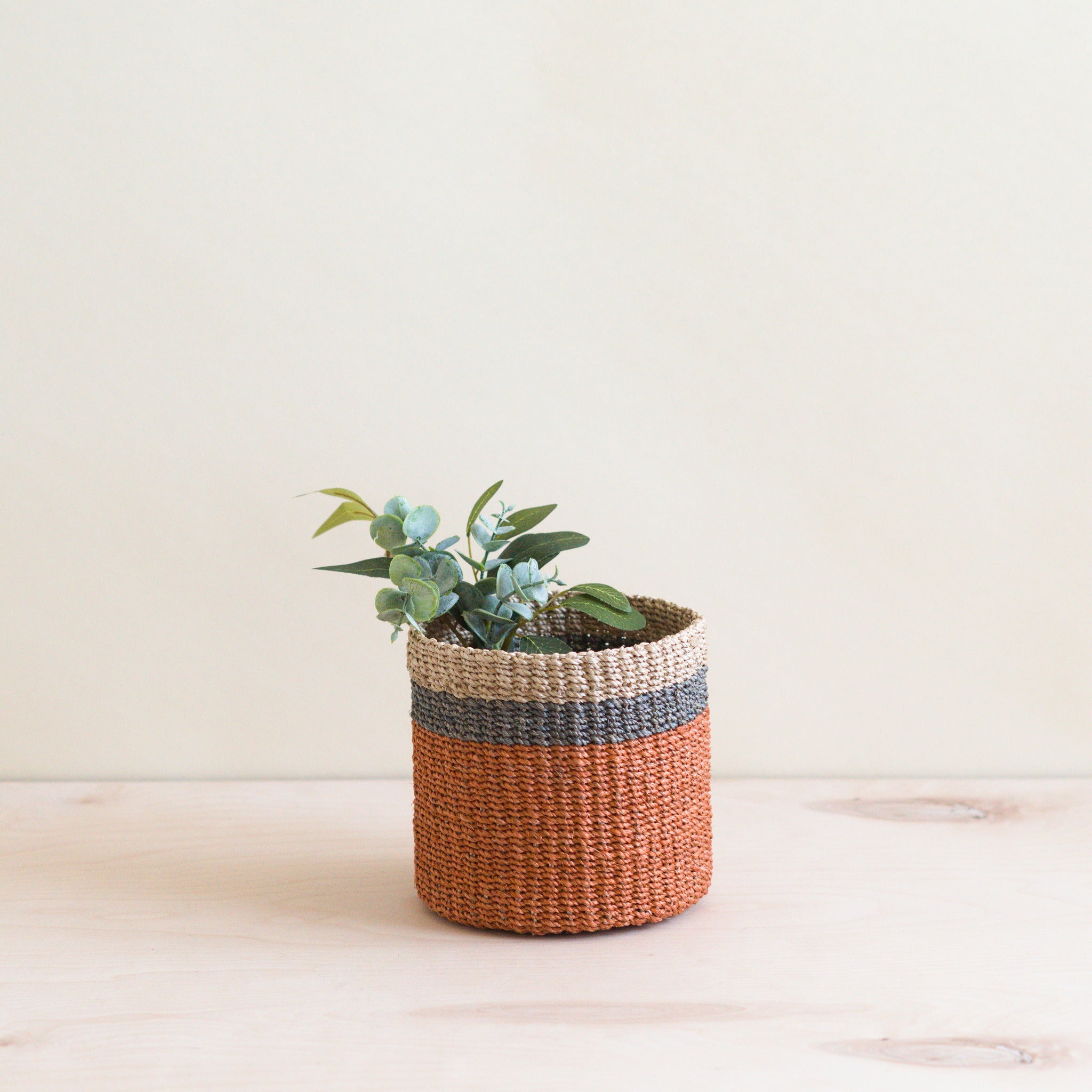 LIKHA_80004_Abaca-Cylinder-Tabletop-Basket_Coral-3.jpg