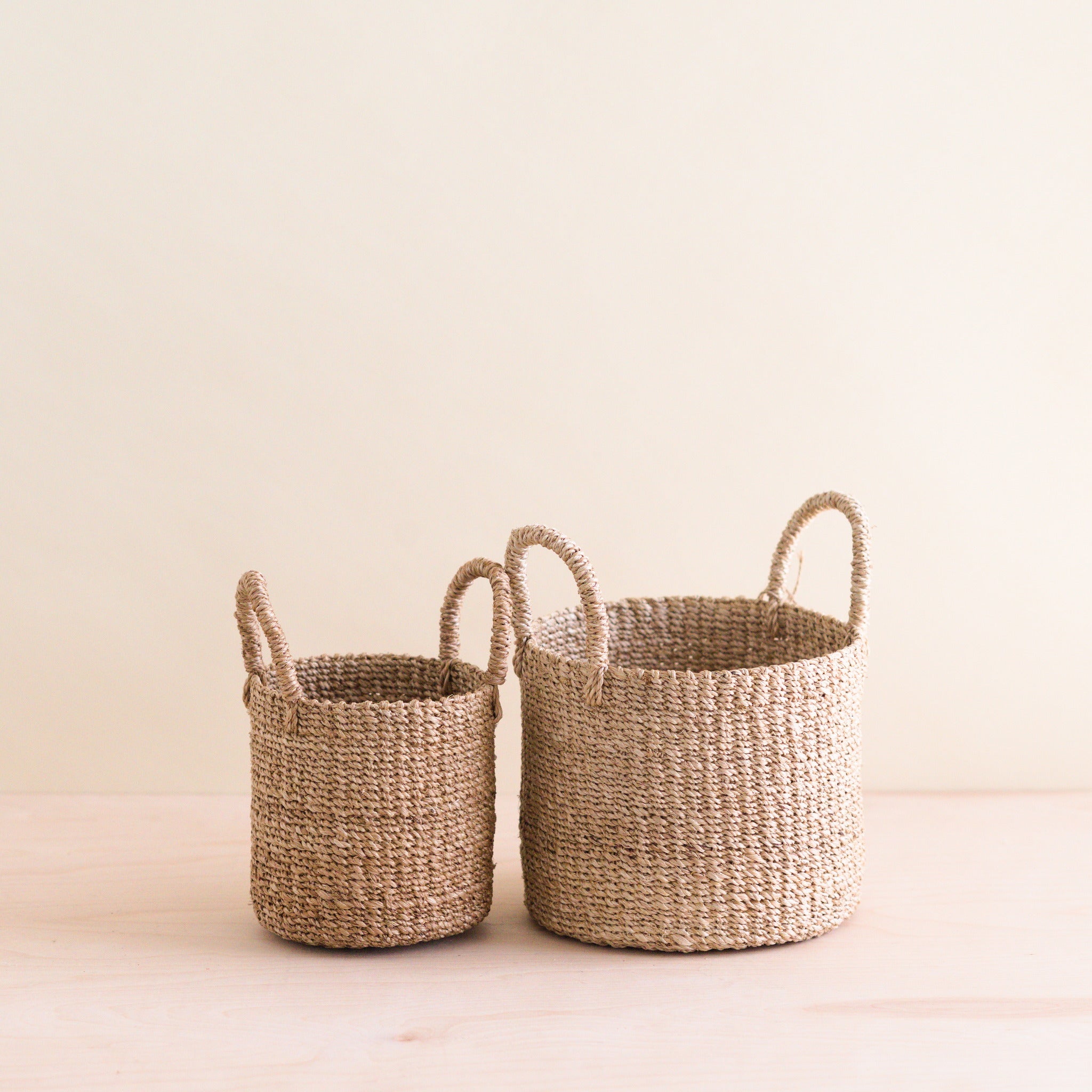 LIKHA_80013_Abaca-Cylinder-Tabletop-Basket-with-Handles-s2-1.jpg