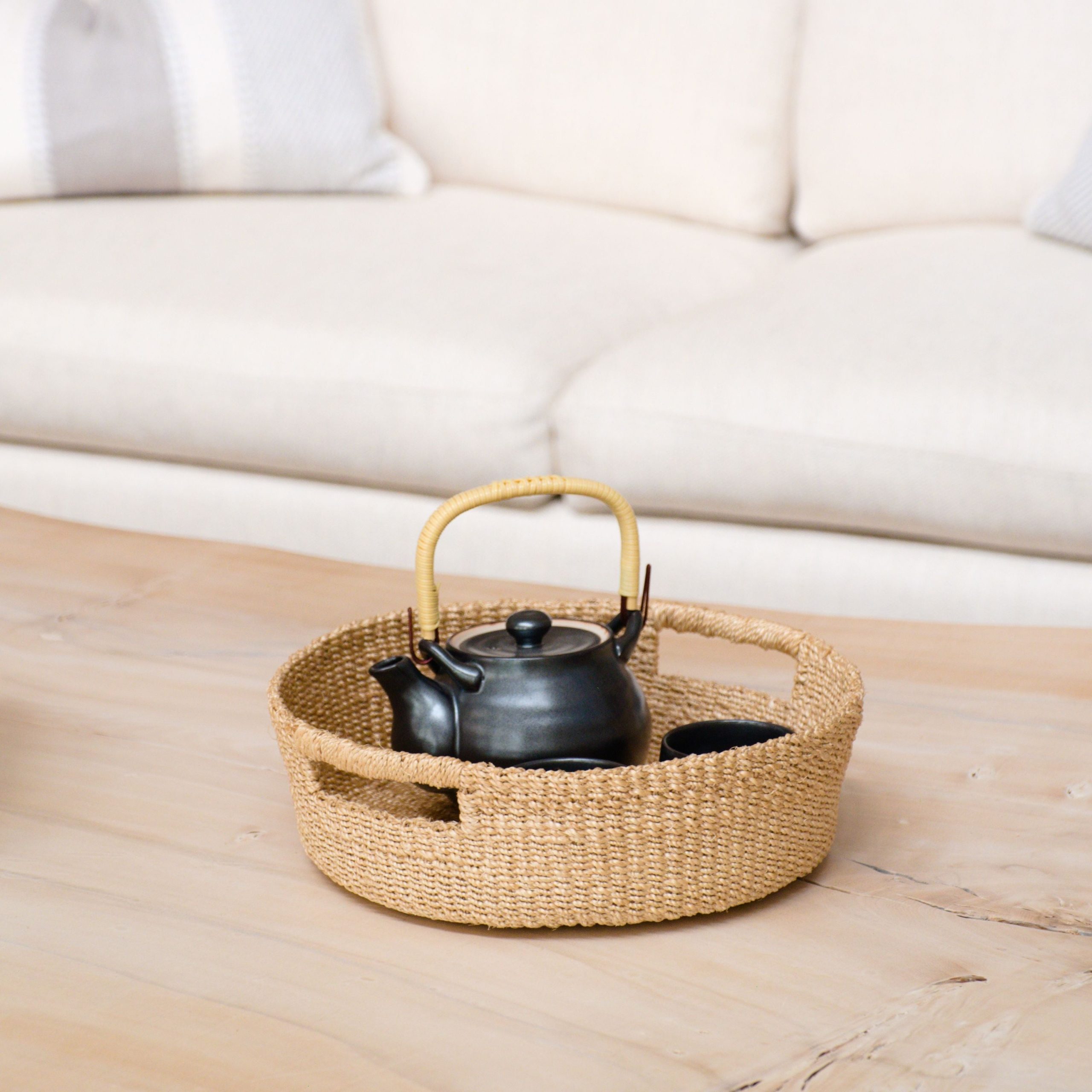 LIKHA_80117_Abaca-Round-Tray-with-Cutout-Handles-5.jpg