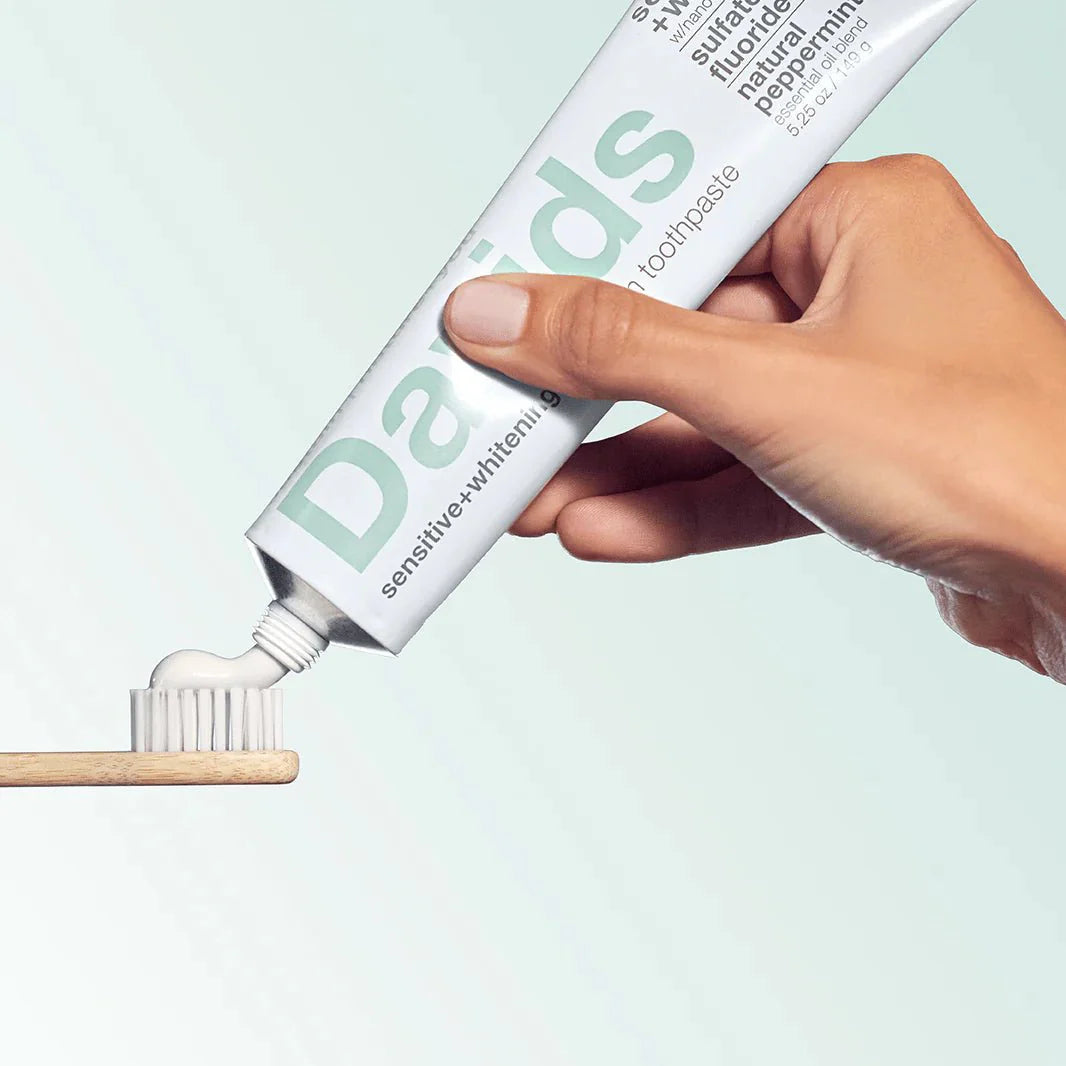 applying-davids-sensitive-toothpaste-to-bamboo-toothbrush.jpg